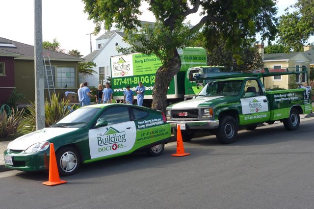 A couple of the vehicles in the building doctors fleet! Honda Insight, GMC Sierra, box truck