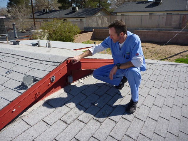 Inspecting a customer's roof