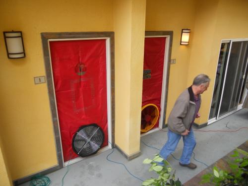 A  blower door test being performed at a multi-family residence